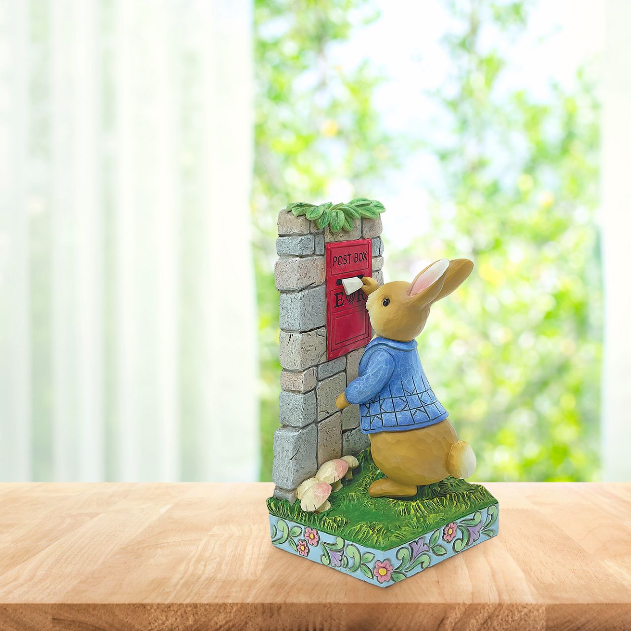 Peter Rabbit Posting Letters Figurine Made from cast stone. Packed in a branded gift box. Unique variations should be expected as this product is hand painted.