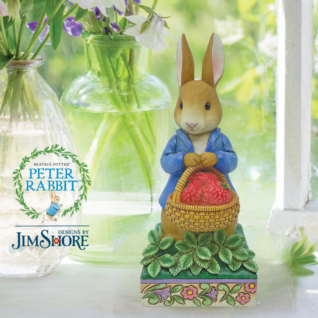 Peter Rabbit with Basket of Strawberries Figurine Made from cast stone. Packed in a branded gift box. Unique variations should be expected as this product is hand painted. Not a toy or children's product. Intended for adults.