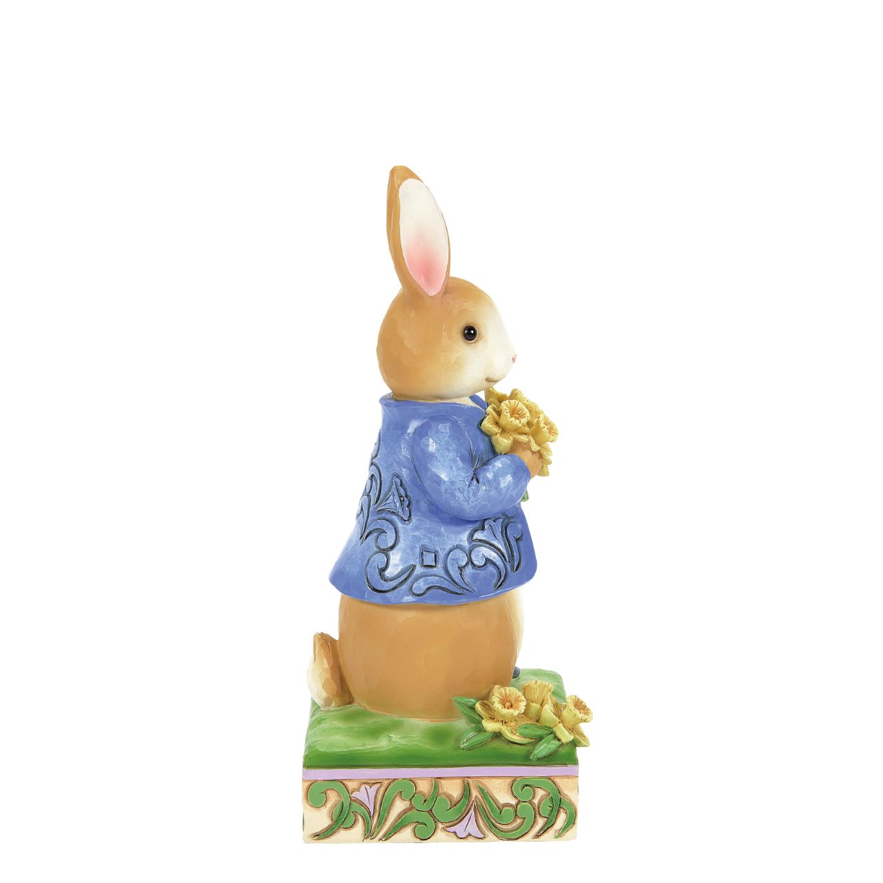 Peter Rabbit with Daffodils - Wearing his signature blue coat, Peter Rabbit blushes as he presents a bouquet of daffodils picked for you in this sweet design. Styled by Jim Shore, Peter's coat boasts rosemale petals as he stands on a decorated stage of springtime growth.