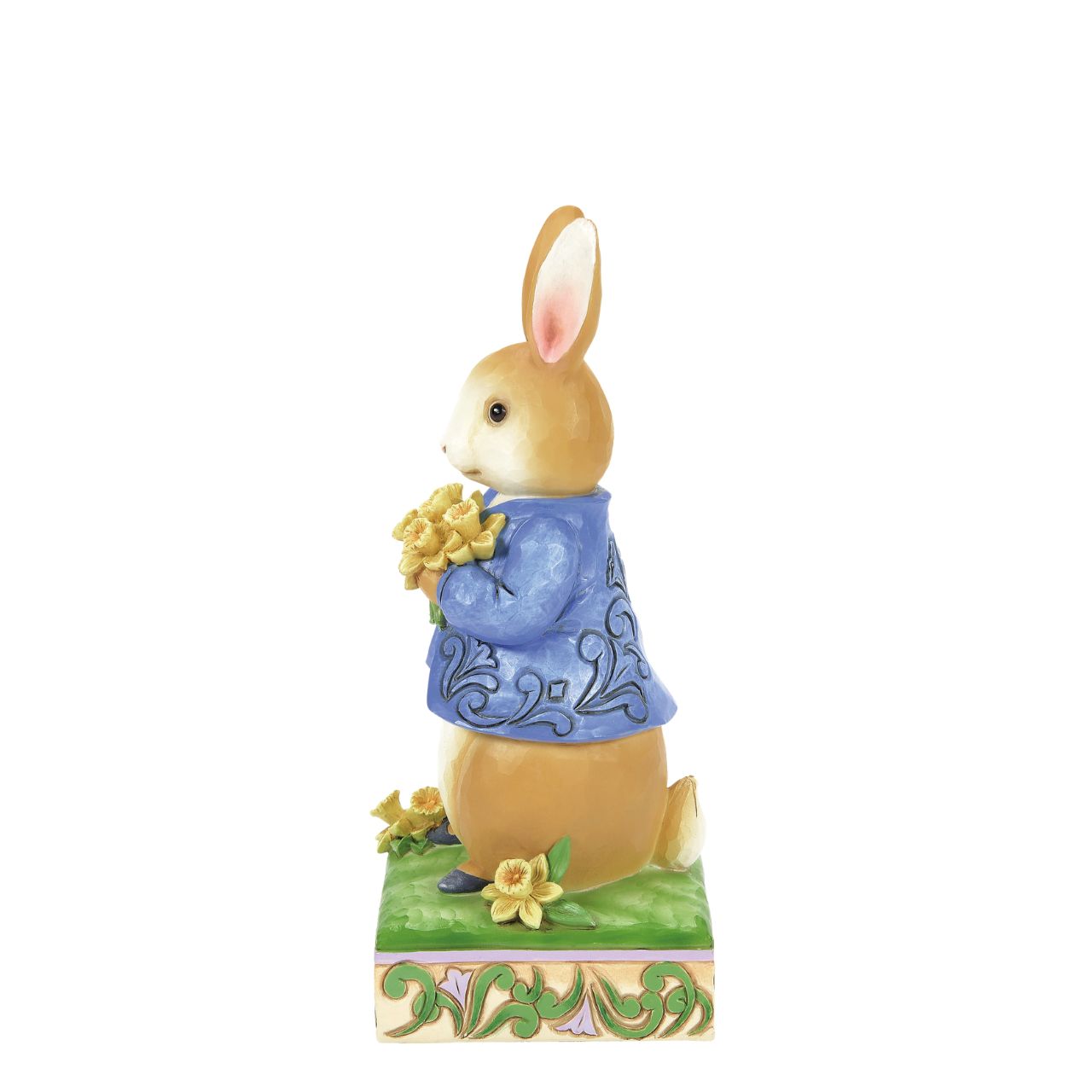 Peter Rabbit with Daffodils - Wearing his signature blue coat, Peter Rabbit blushes as he presents a bouquet of daffodils picked for you in this sweet design. Styled by Jim Shore, Peter's coat boasts rosemale petals as he stands on a decorated stage of springtime growth.