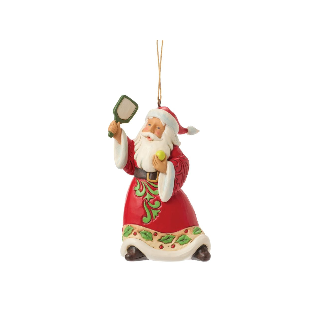 This whimsical Jim Shore Christmas ornament showcases Santa holding a pickleball and racket, ready to serve up both Christmas cheer and a winning game. Dressed in robes adorned with rosemaling and holly, Santa blends festive fun with sporty flair.