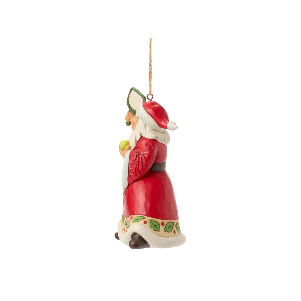 This whimsical Jim Shore Christmas ornament showcases Santa holding a pickleball and racket, ready to serve up both Christmas cheer and a winning game. Dressed in robes adorned with rosemaling and holly, Santa blends festive fun with sporty flair.