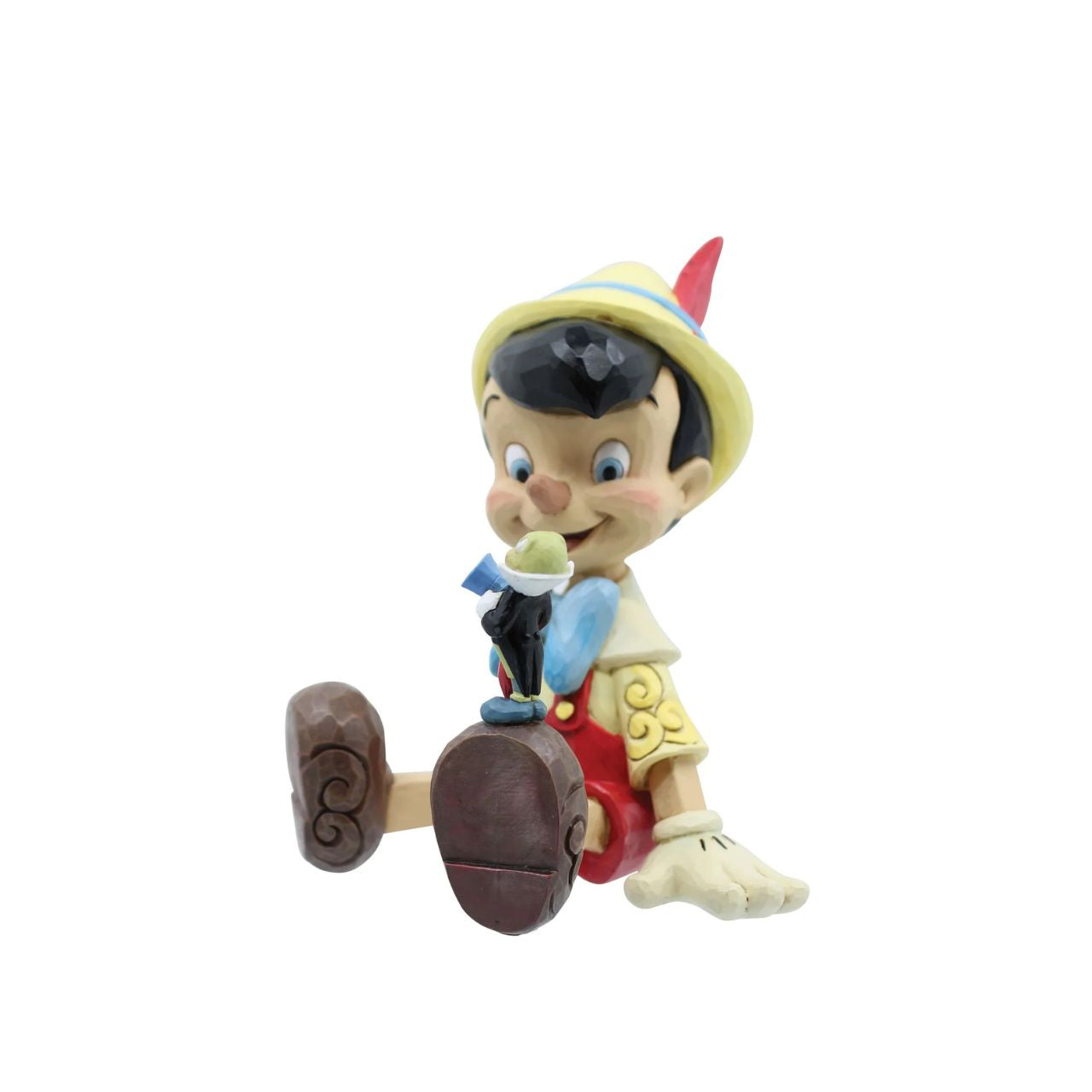 "Wishful and Wise" Jiminy Cricket is quite the dapper conscience in this design by Jim Shore, giving a tip o' his top hat as he smiles and gives his bestie Pinocchio a lesson about temptations.