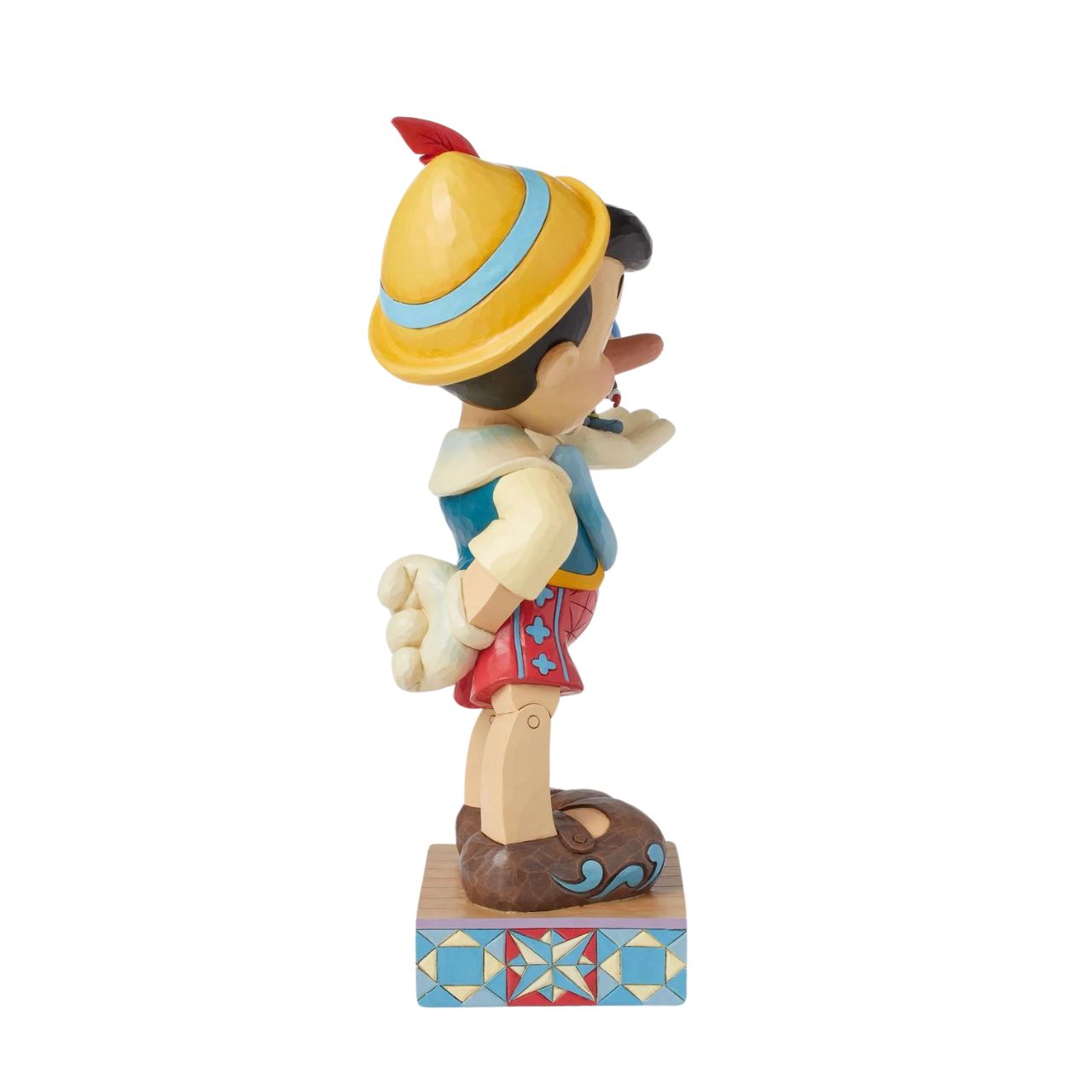 Disney's Pinocchio is the size of a real boy with this figurine. Hand carved and painted, this piece comes from the Disney Traditions collection by Jim Shore. This impressive piece comes packaged in a fully branded gift box.