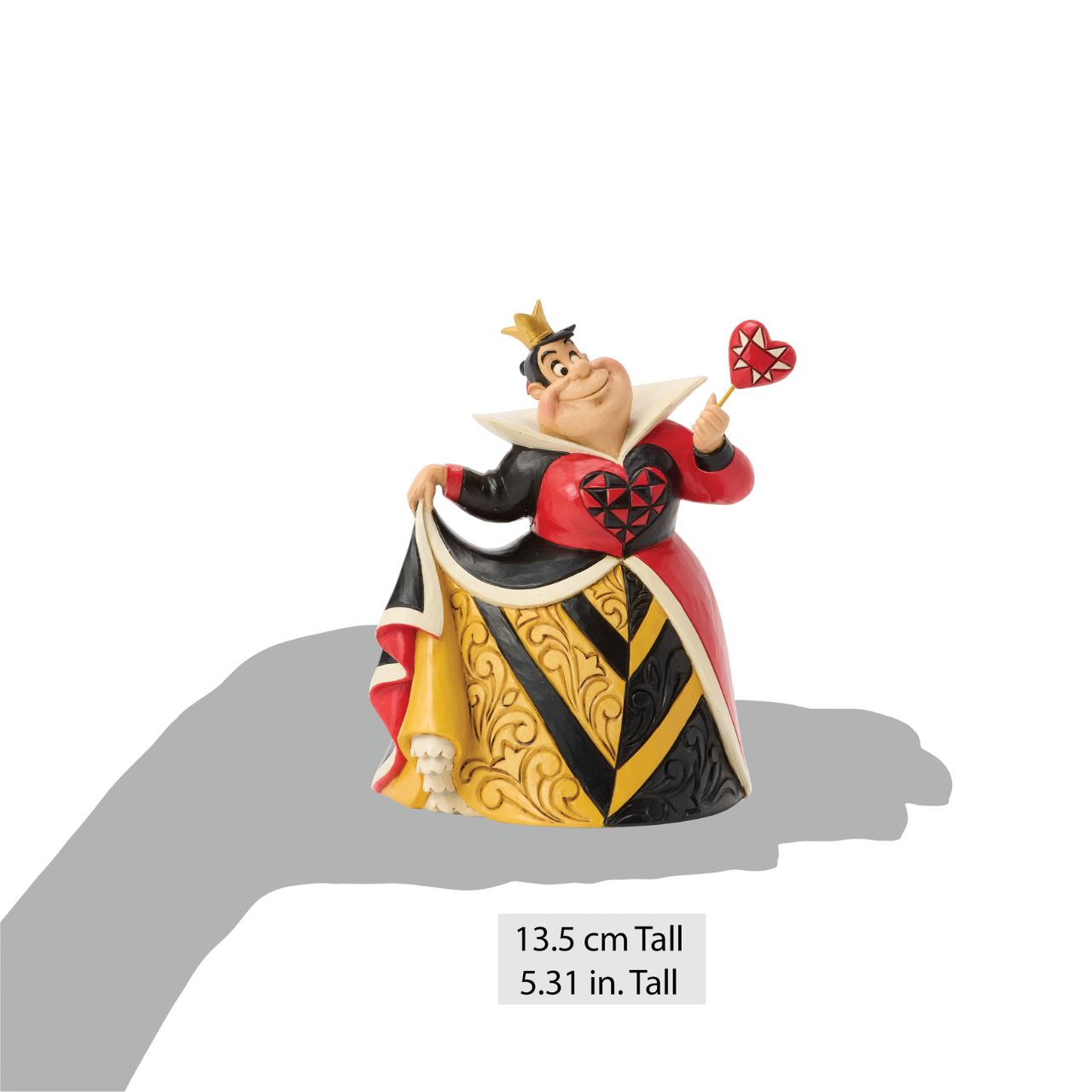 This Jim Shore design captures Alice in Wonderland's Queen of Hearts in a red and black dress enhanced with rosemaling and a quilted heart.