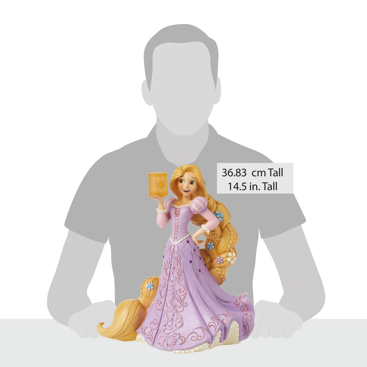 The beautiful dreamer that is Rapunzel from Disney's Tangled has now been recreated by artist Jim Shore as part of his deluxe Disney Traditions collection. Holding a clear resin lantern, Rapunzel is adorned with flowers in her hair and jewels in her dress, making her a truly breath-taking piece.