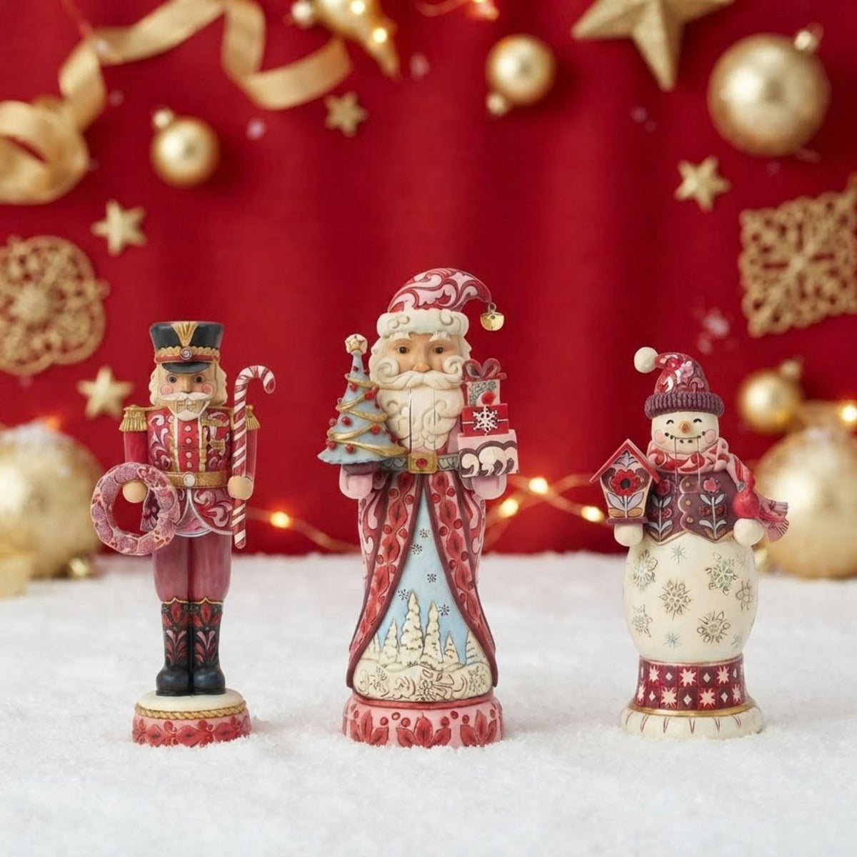 This snowman nutcracker is full of frosty personality, sporting a red top hat, cosy scarf, and cheery smile. Jim Shore's hand-painted folk designs wrap around his coat, adding rich detail and whimsy. A delightful way to bring snowy sparkle indoors.