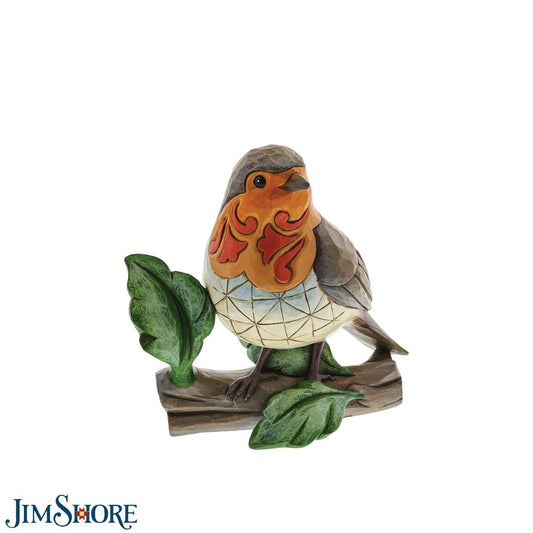 Jim Shore Robin Figurine  "Robins Appear When Loved Ones Are Near" A colourful accent to brighten your day, Jim Shore's richly detailed Robin design features a combination of subtle quilt patterning and beautifully hand-crafted rosemaling motifs.