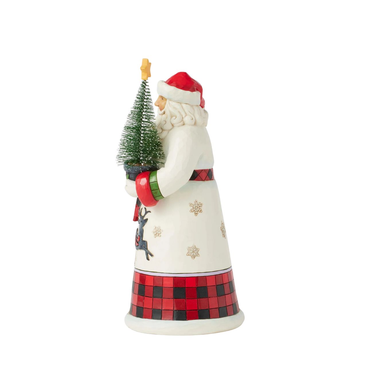 This charming Jim Shore design features Santa holding a decorated sisal tree, dressed in a cosy buffalo plaid cloak that embodies holiday warmth. His gown, adorned with snowflakes and a dashing reindeer silhouette, captures the spirit of the season.