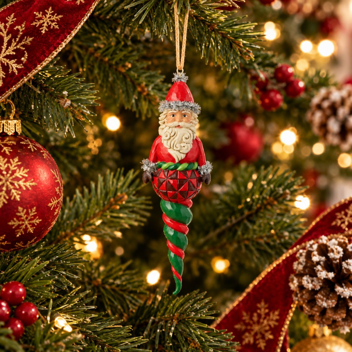 Celebrate the magic of Christmas with the Heartwood Creek Santa Finial by Jim Shore. This meticulously crafted piece captures the warmth and nostalgia of the holiday season, featuring Santa Claus in a classic pose.