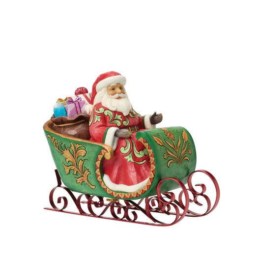 Capture the joy and wonder of the festive season with this Special Edition Santa from Jim Shore's Heartwood Creek collection. Sweeping through sparkling winter snow in an ornate sleigh, Santa brings holiday cheer to life while a wind-up musical feature plays the beloved tune of "Jingle Bells".