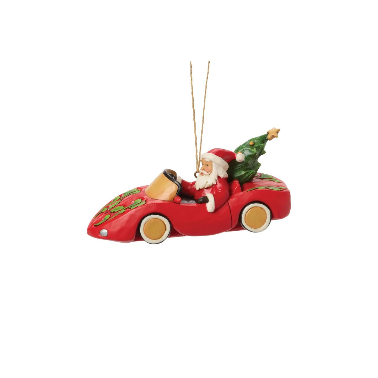 This playful Jim Shore Christmas ornament features Santa cruising in a red sports car adorned with holly, his face beaming with holiday joy. With a Christmas tree and presents packed in the back seat, Santa is ready to spread cheer in sporty style.