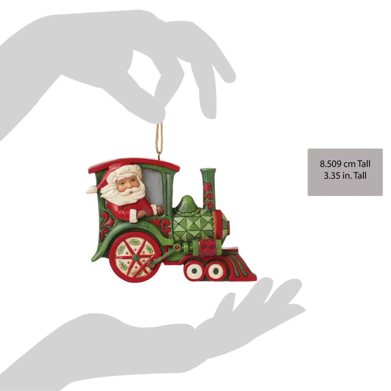 All aboard the Christmas train, next stop, holiday memories! Santa steers this fantastic red and green rosemaling locomotive with mistletoe powered wheels. Hang this stylish train in your tree and admire the creative craftsmanship of Jim Shore.