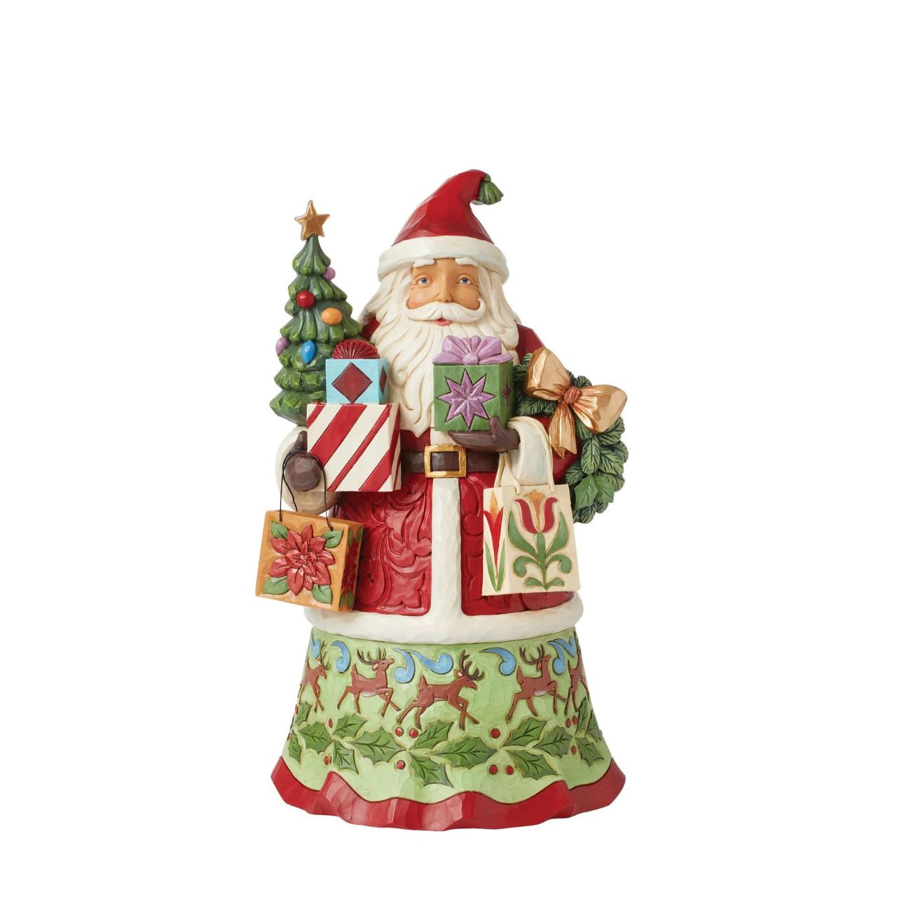 First Edition Signed Figurine - Limited Quantity. Santa is ready to deliver this Christmas. Hand painted, this figurine features Santa with arms full of gifts and is the perfect addition to any festive display.