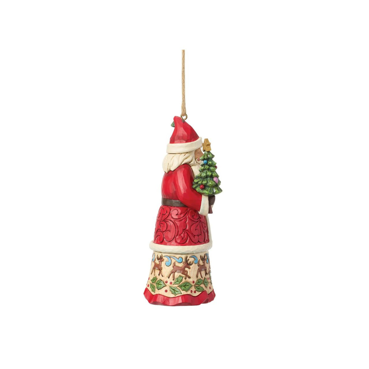 Celebrate the magic of Christmas with this enchanting Santa figurine from Heartwood Creek by Jim Shore. Depicting Santa Claus lovingly holding a variety of colourful gifts, this piece is meticulously crafted with intricate details and folk-art inspired patterns.