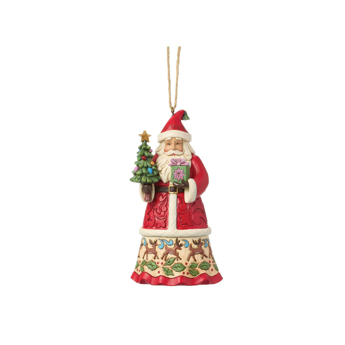 Celebrate the magic of Christmas with this enchanting Santa figurine from Heartwood Creek by Jim Shore. Depicting Santa Claus lovingly holding a variety of colourful gifts, this piece is meticulously crafted with intricate details and folk-art inspired patterns.