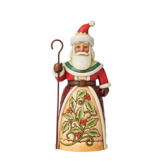 Heartwood Creek Santa with Holly Pint Sized Figurine by Jim Shore  "Ivy, Holly, and Days So Jolly" This pint sized Santa is ideal for stocking fillers, small spaces and displays. Designed with the iconic Heartwood Creek by Jim Shore style, he comes with a staff and an intricate design of holly on his skirt.