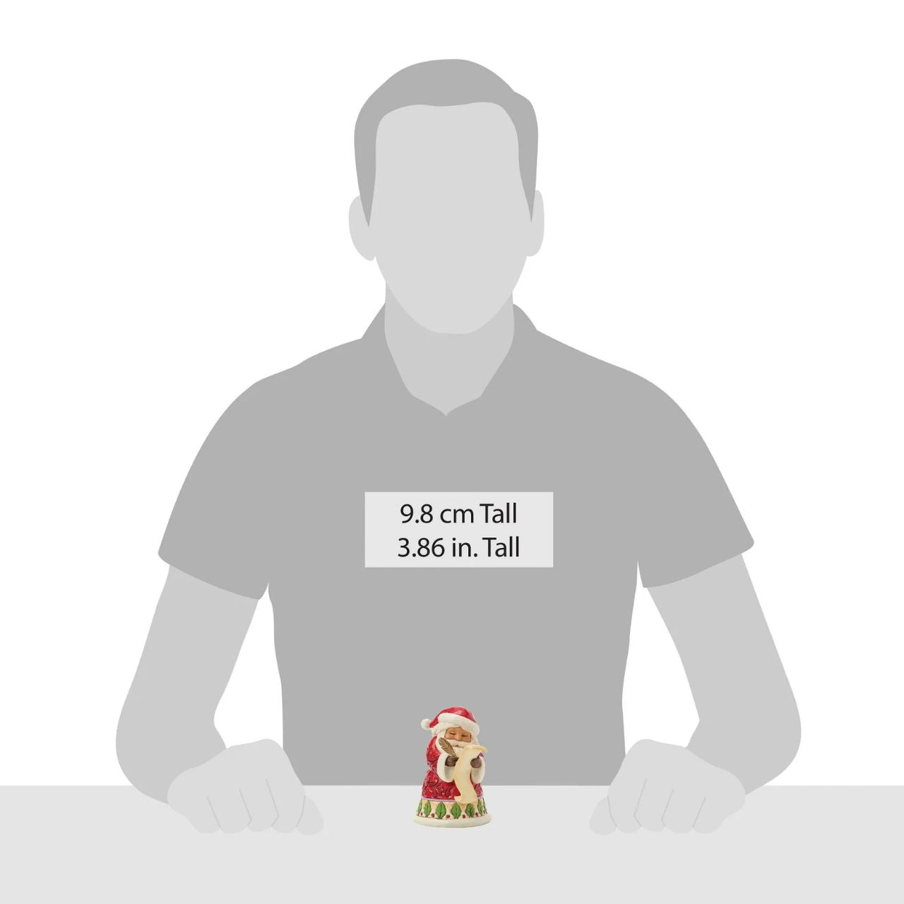 This enchanting Jim Shore miniature Santa wears intricate rosemaling and festive holly as he updates his list, ensuring everyone has a chance to make the nice list. With holiday spirit, he brings anticipation and joy to your holiday celebrations.