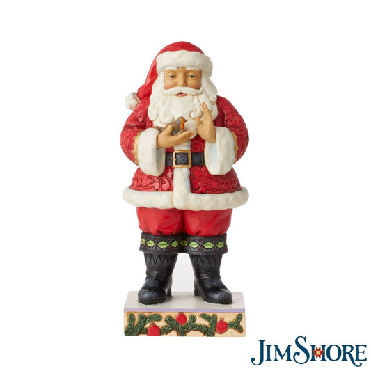 Santa with Robin in Hands Figurine by Jim Shore  Wearing holly brimmed boots and rosemaled suit, this Santa statuette delicately holds a Robin in his hands. Widely revered, Robins are thought to represent loved ones lost. Celebrate the Christmas in remembrance and love with Jim Shore. Exclusively available in UK and Europe.