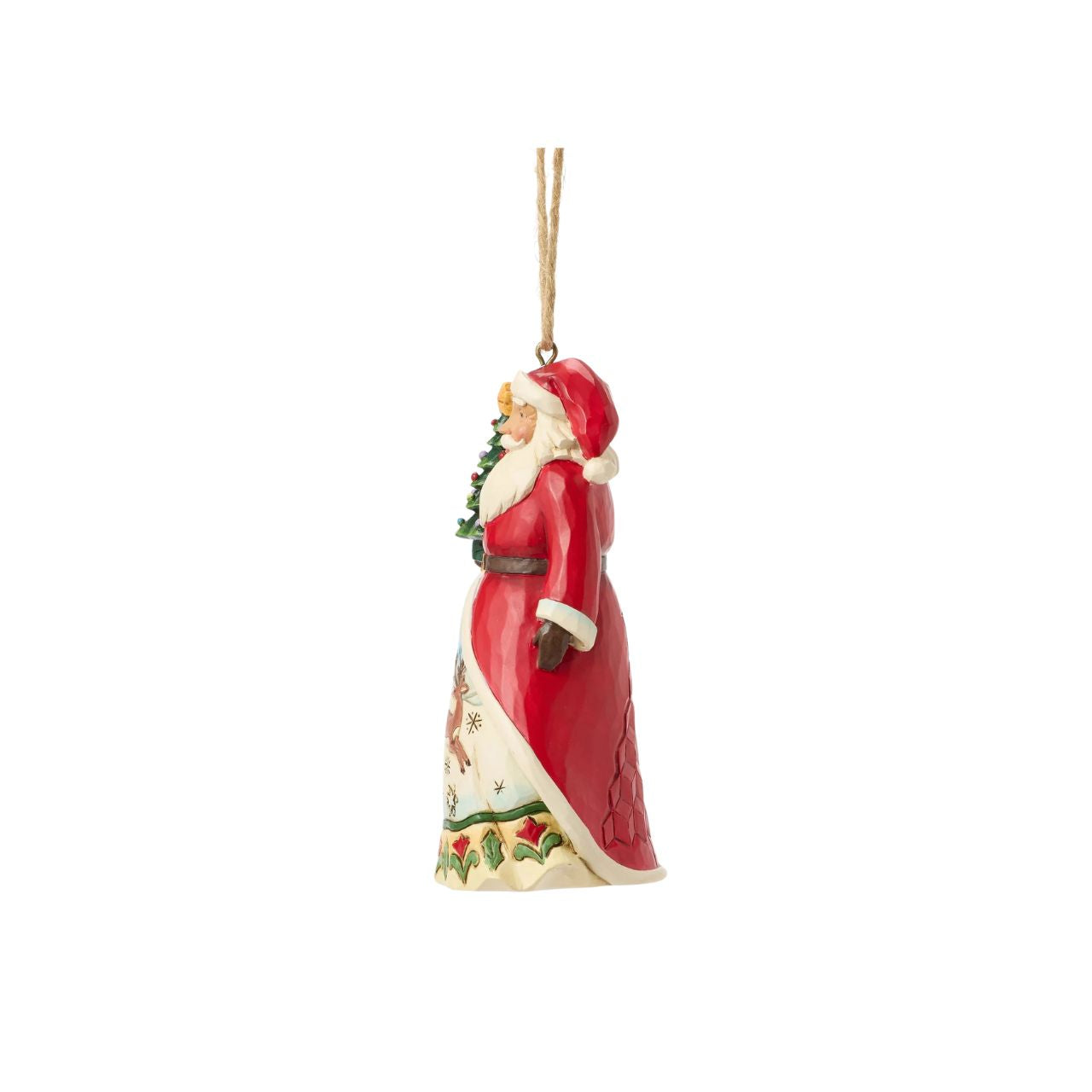 This enchanting Jim Shore Christmas tree ornament features Santa holding a miniature tree and gifts, ready to spread holiday cheer. His cloak opens to reveal a serene winter scene with a playful reindeer frolicking through the snow.