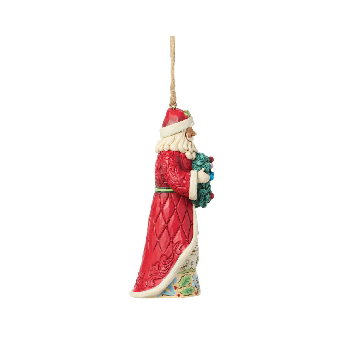 Bring the magic of Christmas to your home with this enchanting Santa figurine from the Heartwood Creek collection by Jim Shore.