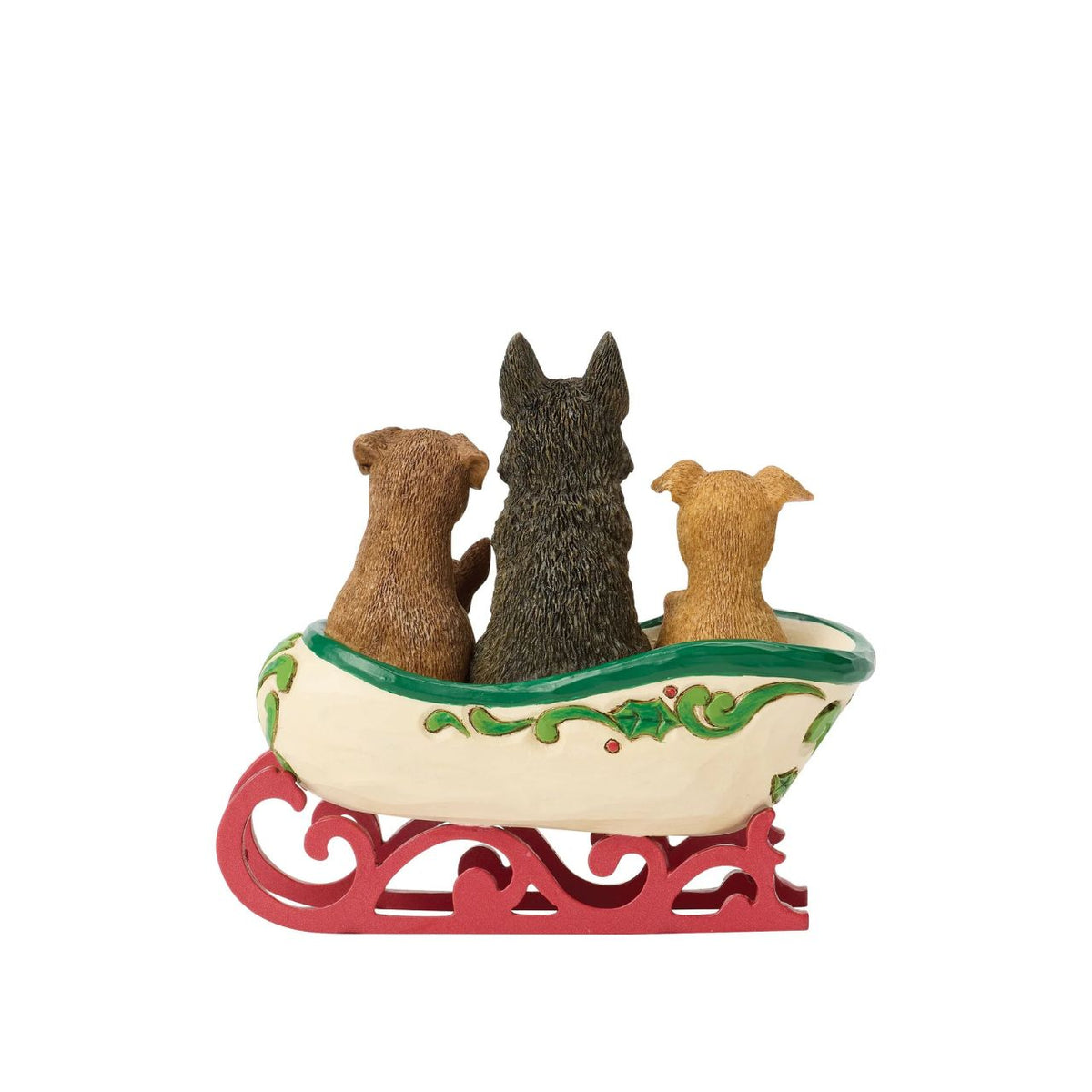 Santa's Rescue Sleigh is delivers loving companions all over the world. A band of adorable pups wait to be welcomed home. Jim Shore's craftsmanship turns a playful moment into a heart-warming decoration.