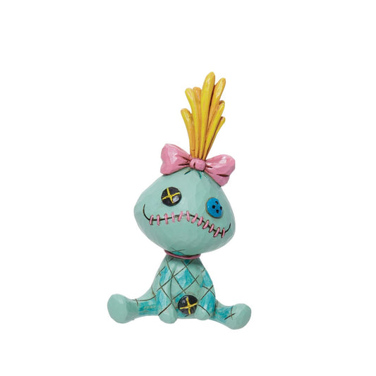 The beloved stuffed toy of Lilo from Disney's Lilo &amp; Stitch, Scrump is an important part of their family &amp; has been immortalised in this cute mini figurine. Designed by award winning artist Jim Shore, hand crafted using high quality cast stone and hand painted. 