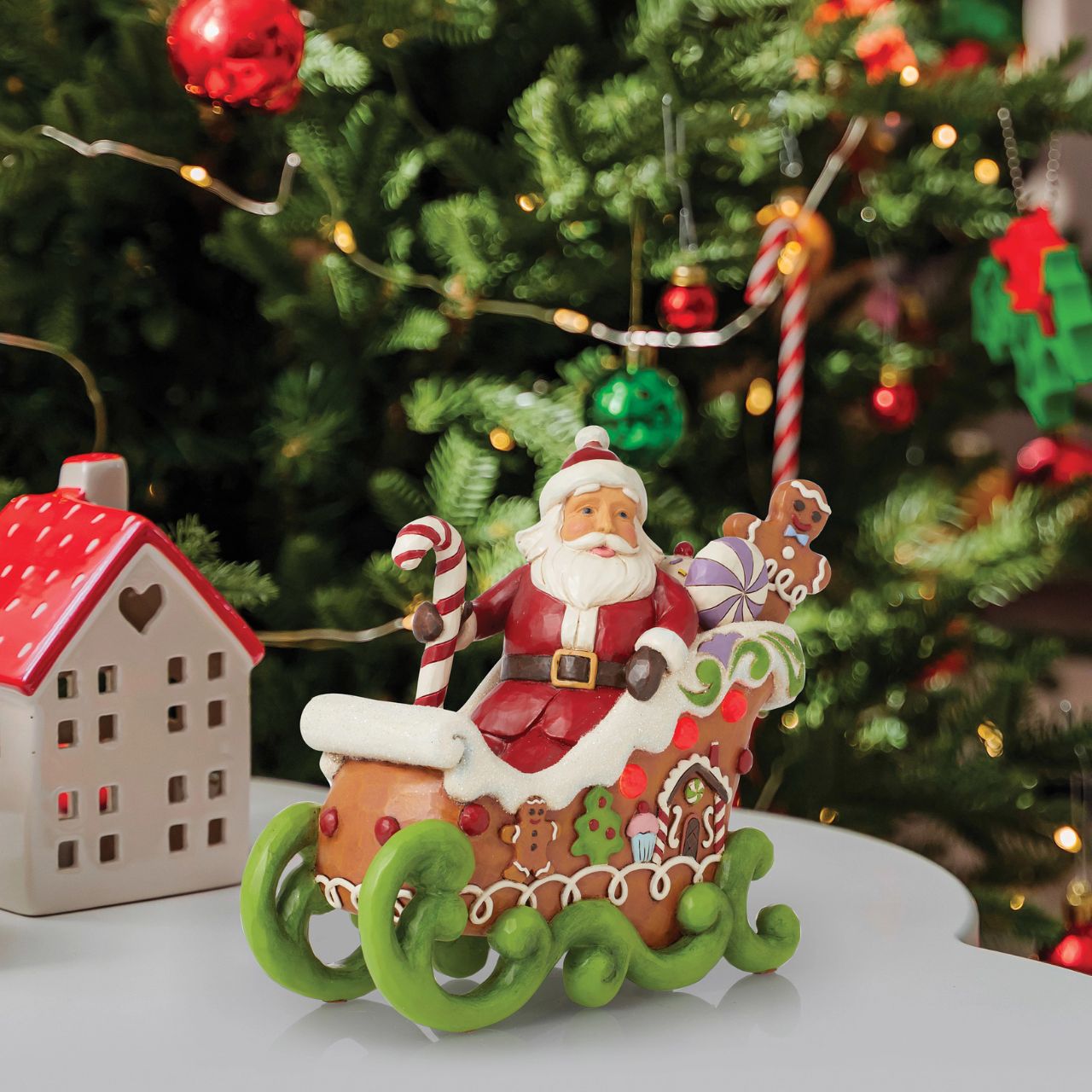 Hand crafted and hand painted, straight from the imagination of award-winning artist Jim Shore. Taking inspiration from traditional folk art, quilting designs, and iconic features like rosemaling, the mixture of colour, tones and glitter make each piece the perfect accessory for the best time of year - Christmas.