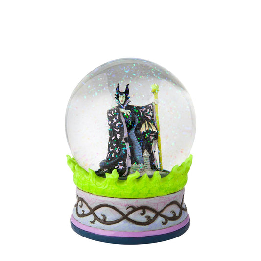 Disney's Sleeping Beauty Maleficent  Christmas Snow Globe  This waterball is almost caldron-like with it's eerie green flames and evil centerpiece. Maleficent, the bitter witch of Disney's Sleeping Beauty, strikes a dubious pose in the water. With immaculate craftsmanship this Jim Shore piece astonishes.