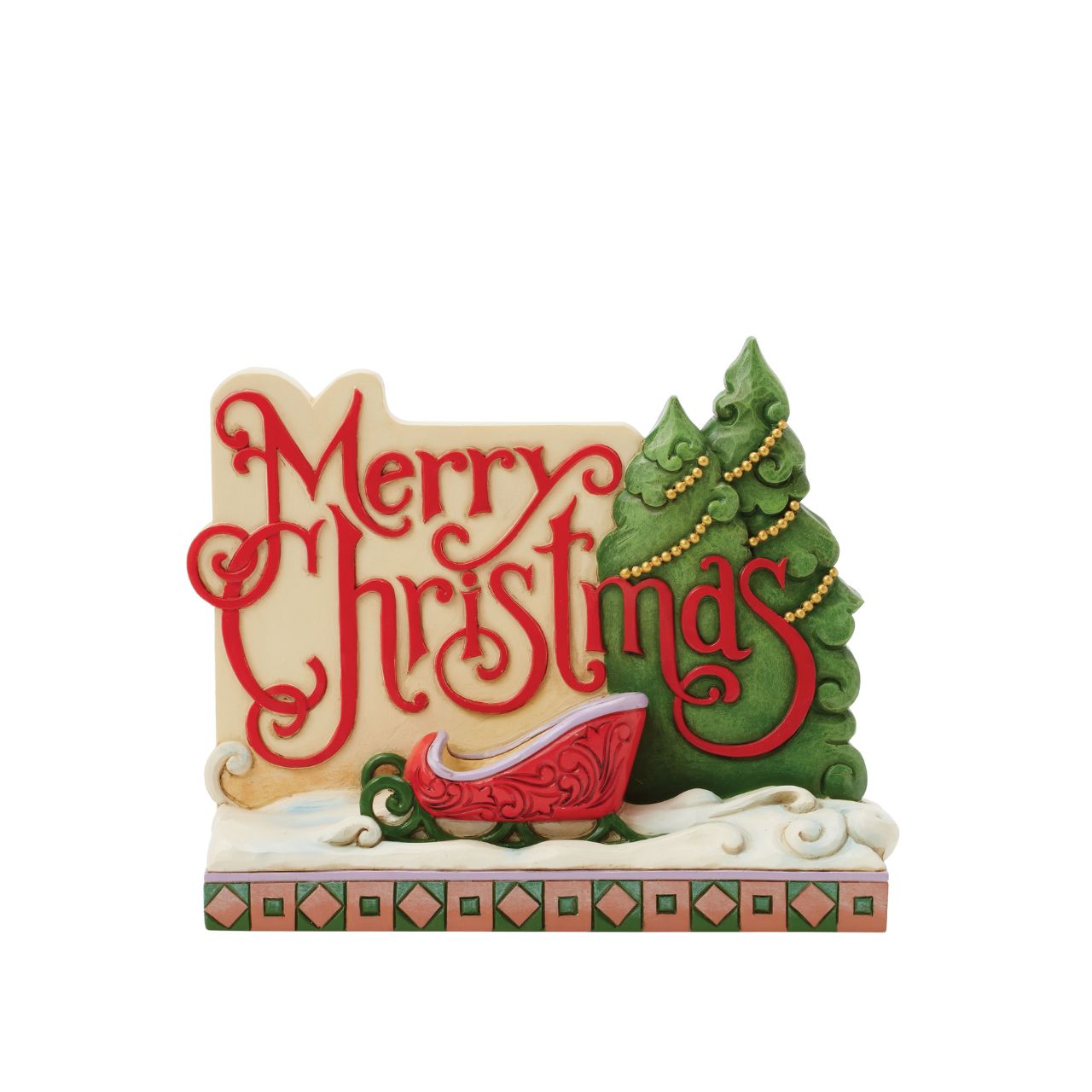 This festive Christmas at the Lodge Jim Shore holiday sign cheerfully reads "Merry Christmas" in curly, joyful script. Featuring decorated pine trees, a red and green sled on freshly fallen snow, this inviting piece brings holiday warmth and wishes every year.
