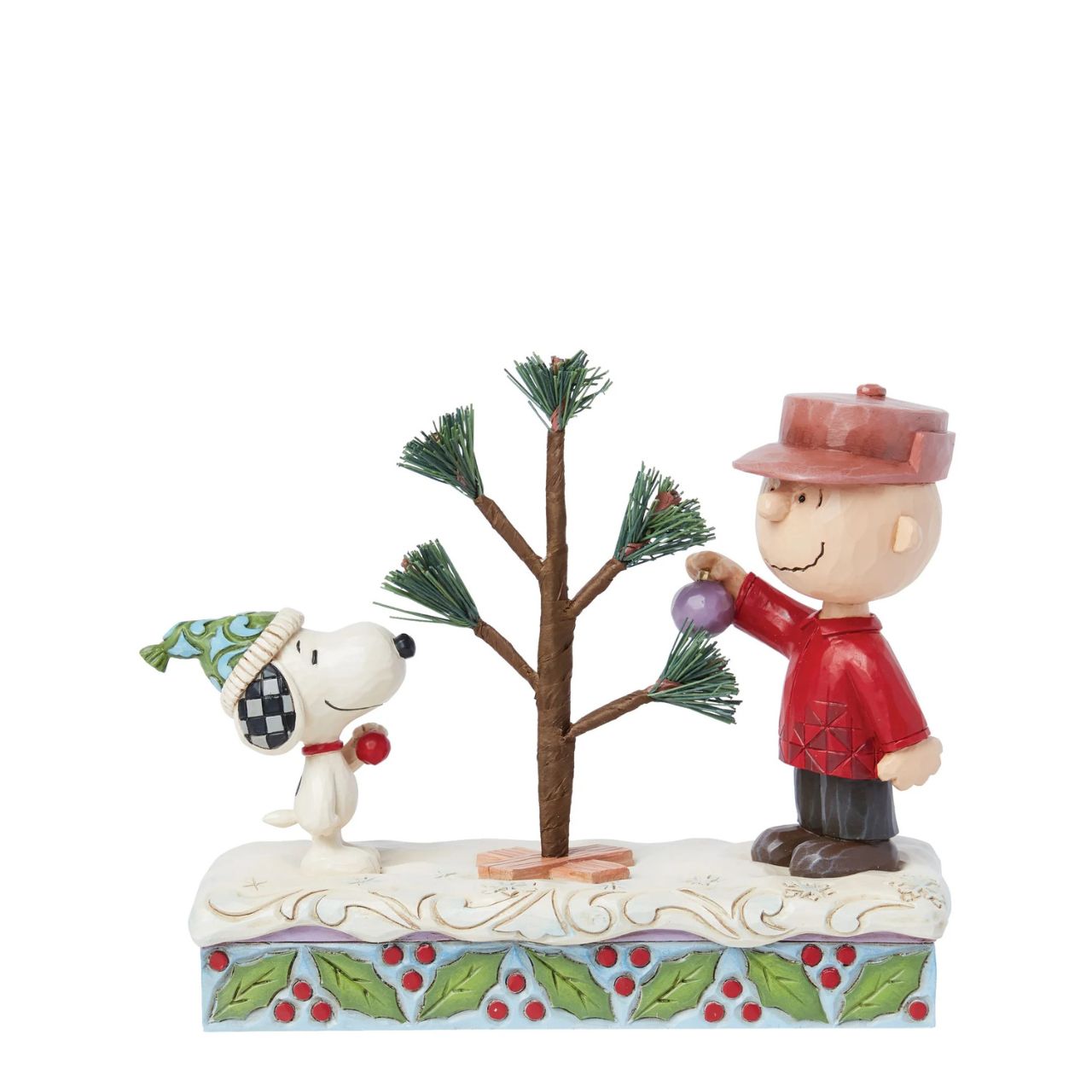 This iconic Jim Shore creation shares a memorable scene from "A Charlie Brown Christmas" special. Charlie picked out a small sampling with hardly any branches, nevertheless, the Peanuts gang came together to decorate it into something wonderful.