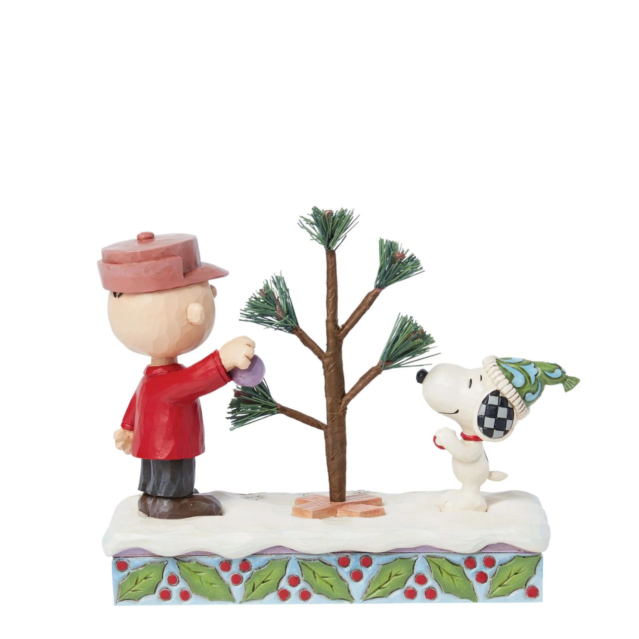 This iconic Jim Shore creation shares a memorable scene from "A Charlie Brown Christmas" special. Charlie picked out a small sampling with hardly any branches, nevertheless, the Peanuts gang came together to decorate it into something wonderful.