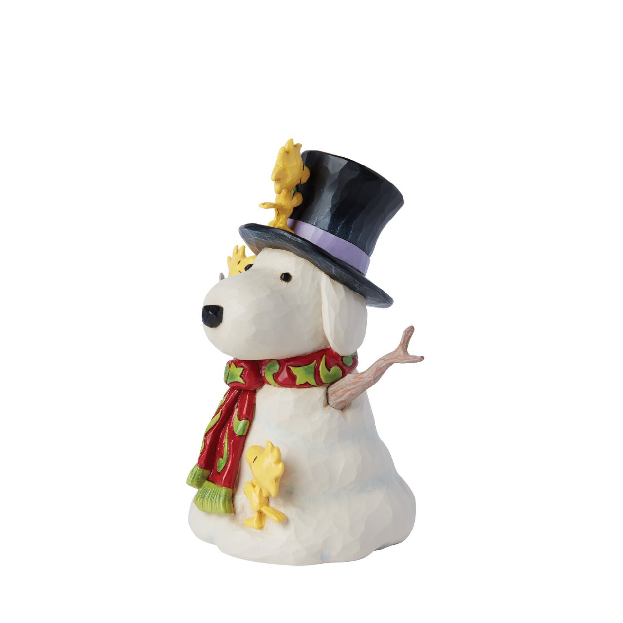 This cheerful creation from Jim Shore shares a scene of Woodstock and his brothers sculpting a snowman in the shape of Snoopy. Modelling their creation after their best friend, the birds lovingly adjust the snowman's hat and rosemale scarf.