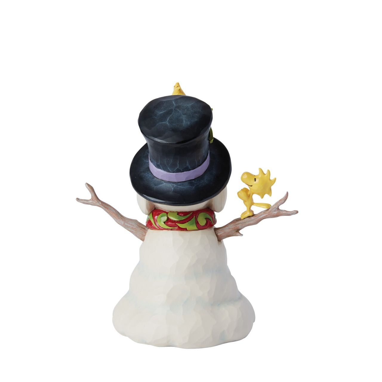 This cheerful creation from Jim Shore shares a scene of Woodstock and his brothers sculpting a snowman in the shape of Snoopy. Modelling their creation after their best friend, the birds lovingly adjust the snowman's hat and rosemale scarf.