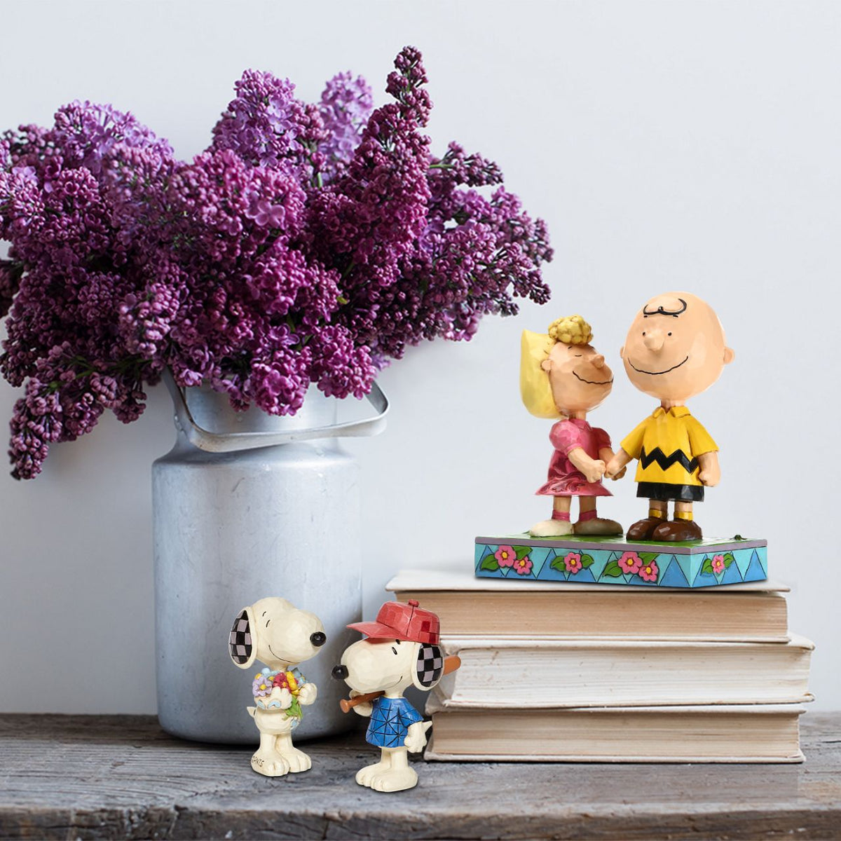 Treat yourself or someone special to Peanuts by Jim Shore collectable figurine. It's springtime and the world's most famous comic strip pup has picked some lovely flowers for you.