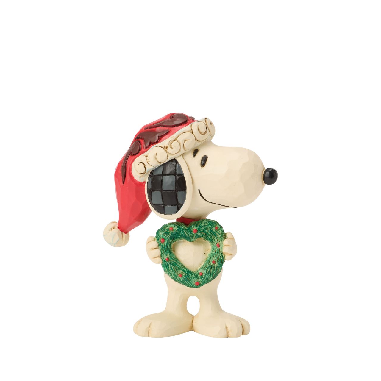 Snoopy holds a heart-shaped wreath in a Santa hat in this darling Jim Shore figurine. Small yet full of holiday charm, it celebrates friendship and Peanuts nostalgia with Christmas warmth.