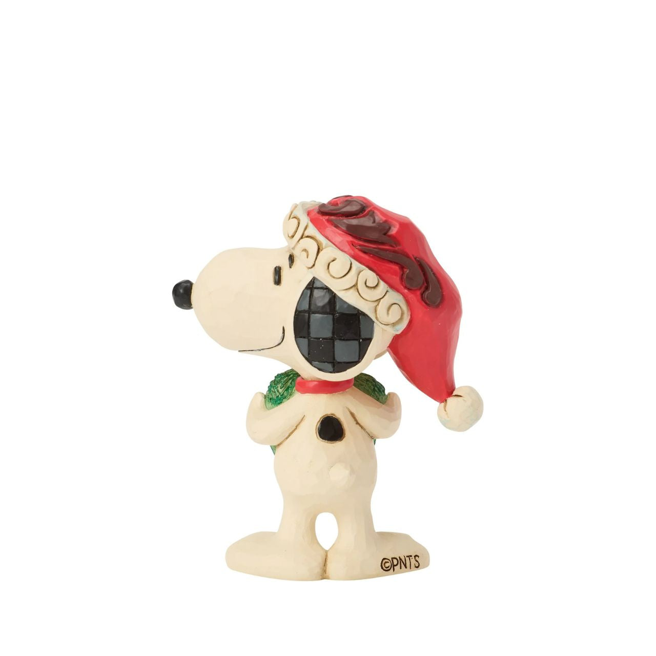 Snoopy holds a heart-shaped wreath in a Santa hat in this darling Jim Shore figurine. Small yet full of holiday charm, it celebrates friendship and Peanuts nostalgia with Christmas warmth.