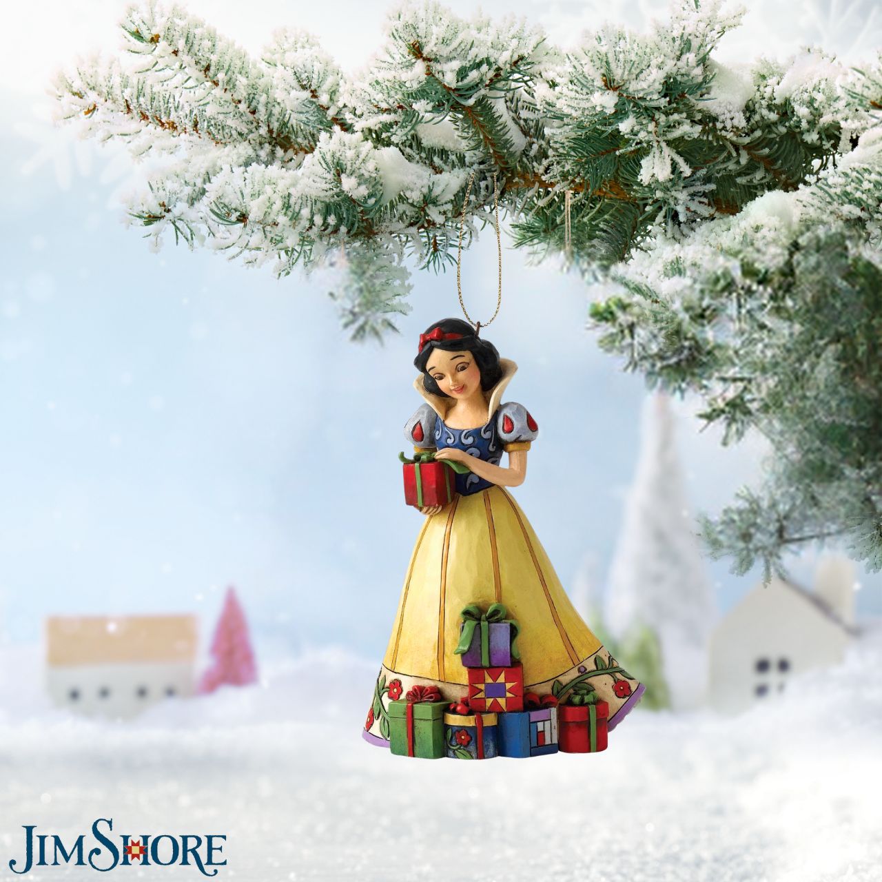 Jim Shore Disney Snow White Hanging Ornament  Disney Traditions combines the magic of Disney with the festive artistry of Jim Shore. This Snow White cast stone hanging ornament is sure to add Disney's magic to your Christmas tree. Unique variations should be expected as this product is hand painted. 