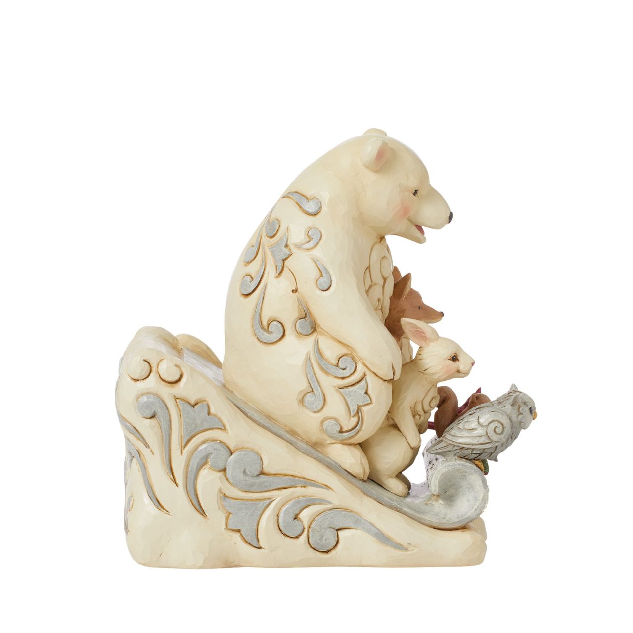 From the White Woodland collection as part of Heartwood Creek by Jim Shore, this group of animal friends having fun in the snow is the perfect addition to any Christmas display.