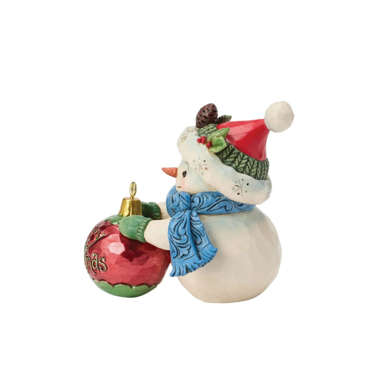 Embrace the enchantment of winter with this delightful miniature snowman figurine from Heartwood Creek by Jim Shore. This endearing snowman holds a large, beautifully detailed ball, showcasing Jim Shore's signature folk-art style.