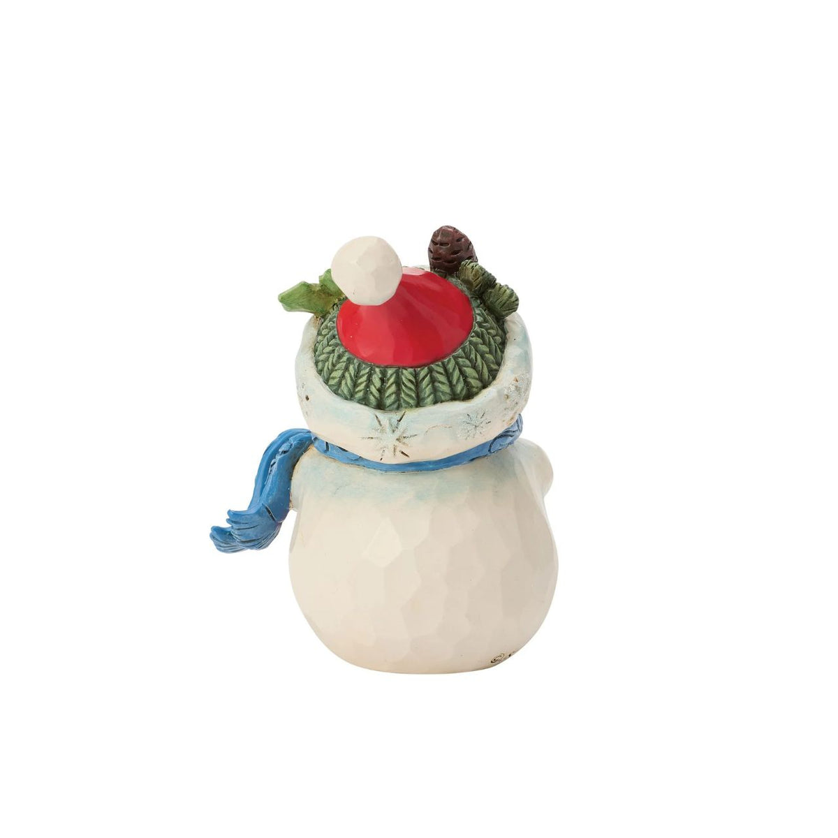 Embrace the enchantment of winter with this delightful miniature snowman figurine from Heartwood Creek by Jim Shore. This endearing snowman holds a large, beautifully detailed ball, showcasing Jim Shore's signature folk-art style.