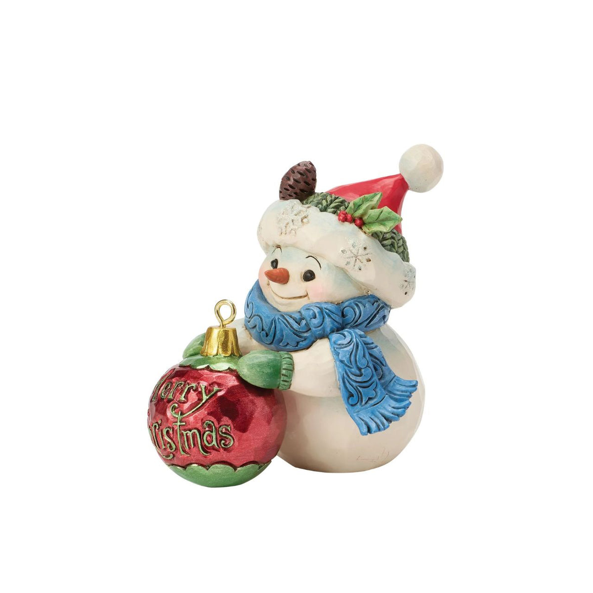 Embrace the enchantment of winter with this delightful miniature snowman figurine from Heartwood Creek by Jim Shore. This endearing snowman holds a large, beautifully detailed ball, showcasing Jim Shore's signature folk-art style.