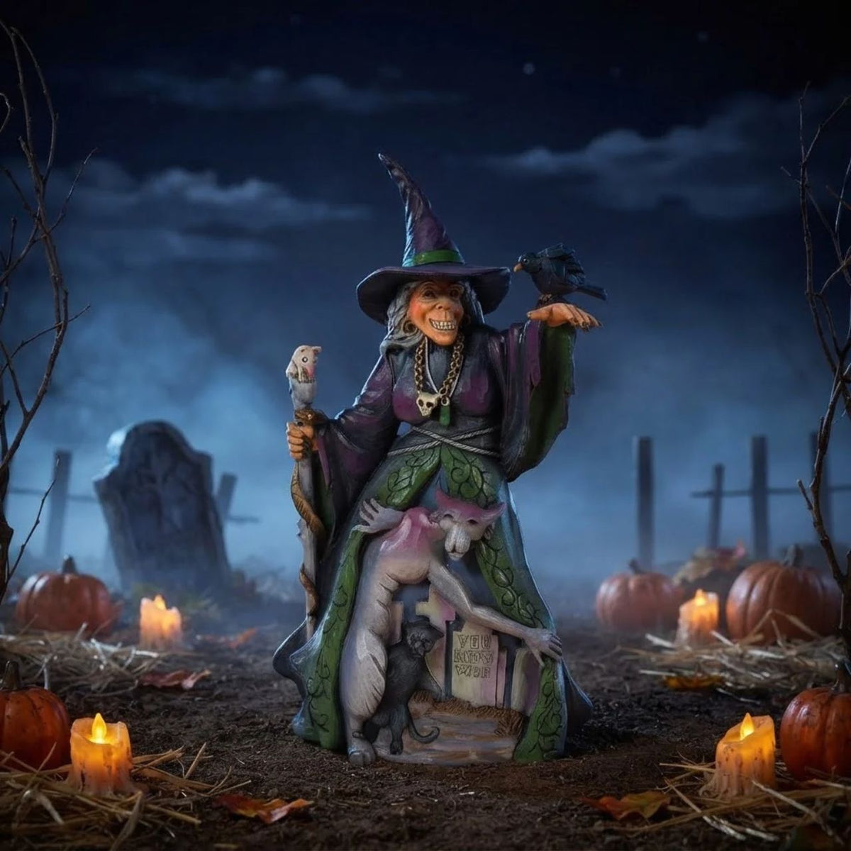 Enter the enchanting world of Halloween with this haunting Jim Shore witch figurine, adorned in ghastly purple and green robes, a perched crow and a staff with a slithering snake. Her cloak reveals a chilling graveyard scene with a spook and a black cat.