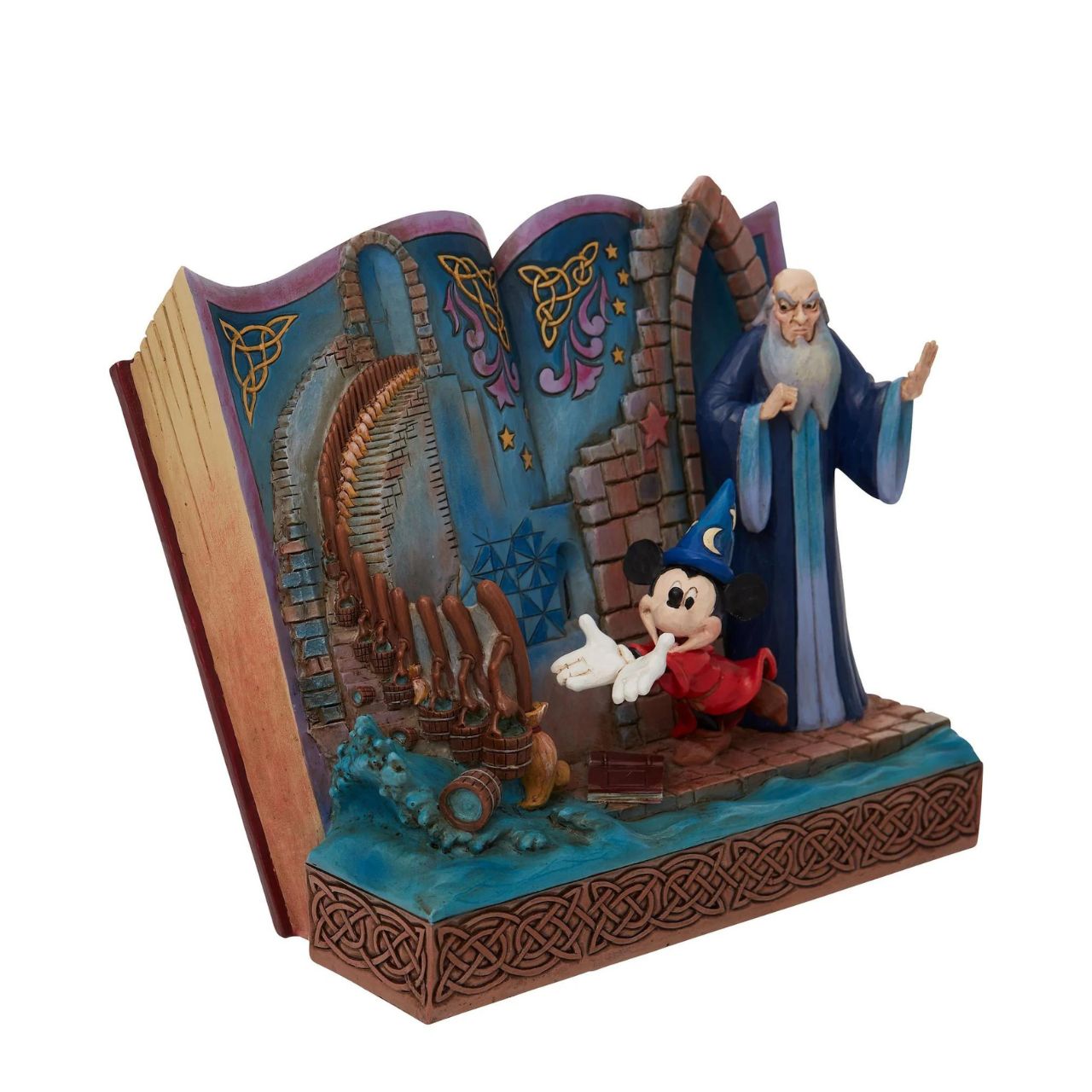 Disney Showcase Sorcerer Mickey Storybook Figurine  Jim Shore re-imagines Fantasia in fantastic fashion in this enchanting statuette by Jim Shore. Mickey Mouse plays sorcerer as he enchants broomsticks to do chores while mentor Yen Sid watches. The complete scene rests inside the pages of a storybook.