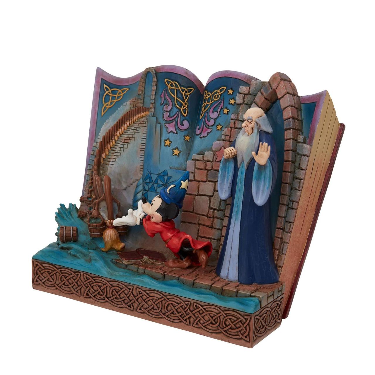 Disney Showcase Sorcerer Mickey Storybook Figurine  Jim Shore re-imagines Fantasia in fantastic fashion in this enchanting statuette by Jim Shore. Mickey Mouse plays sorcerer as he enchants broomsticks to do chores while mentor Yen Sid watches. The complete scene rests inside the pages of a storybook.