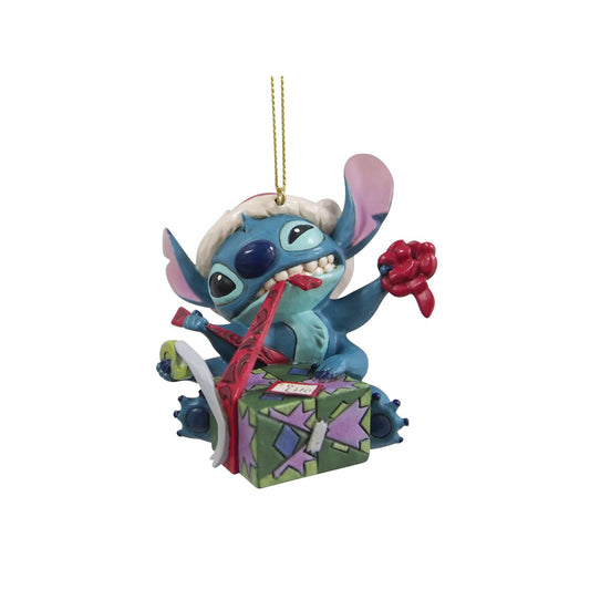 Stitch is eager to get to his gift this Christmas morning. This cute hanging ornament is the perfect addition to your tree and captures the excitement of seeing what Santa has brought.