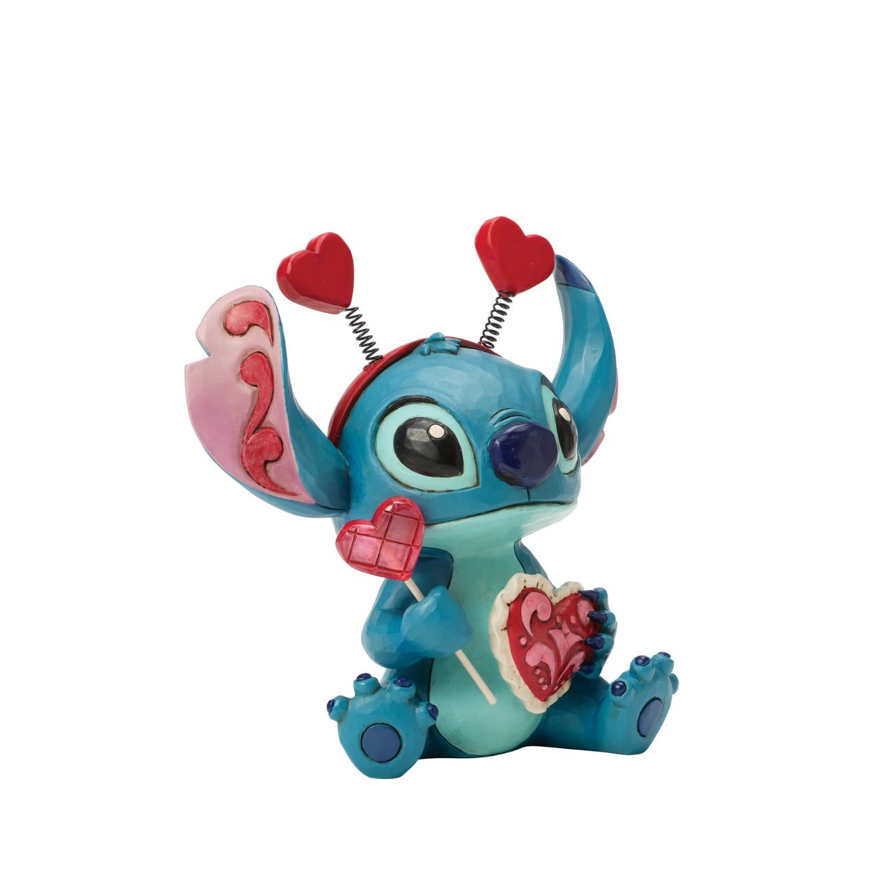 Stitch looks extra sweet in this Jim Shore creation, wearing a heart-topped headband and holding a heart-shaped lollipop.