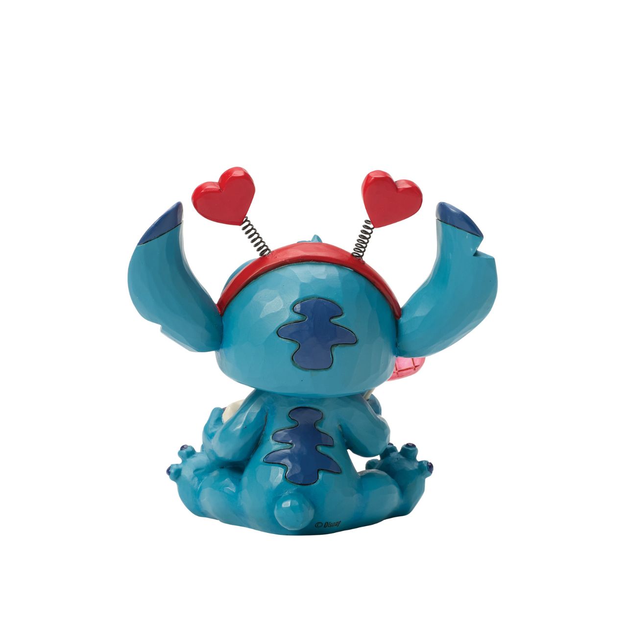 Stitch looks extra sweet in this Jim Shore creation, wearing a heart-topped headband and holding a heart-shaped lollipop.