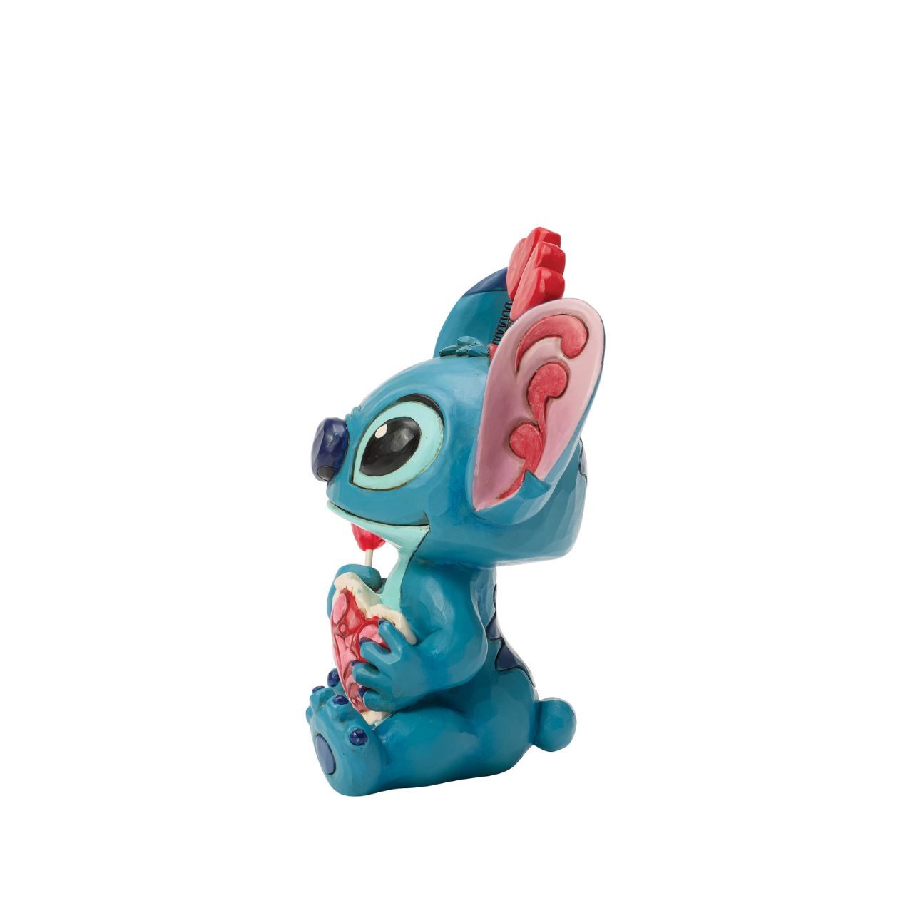 Stitch looks extra sweet in this Jim Shore creation, wearing a heart-topped headband and holding a heart-shaped lollipop.