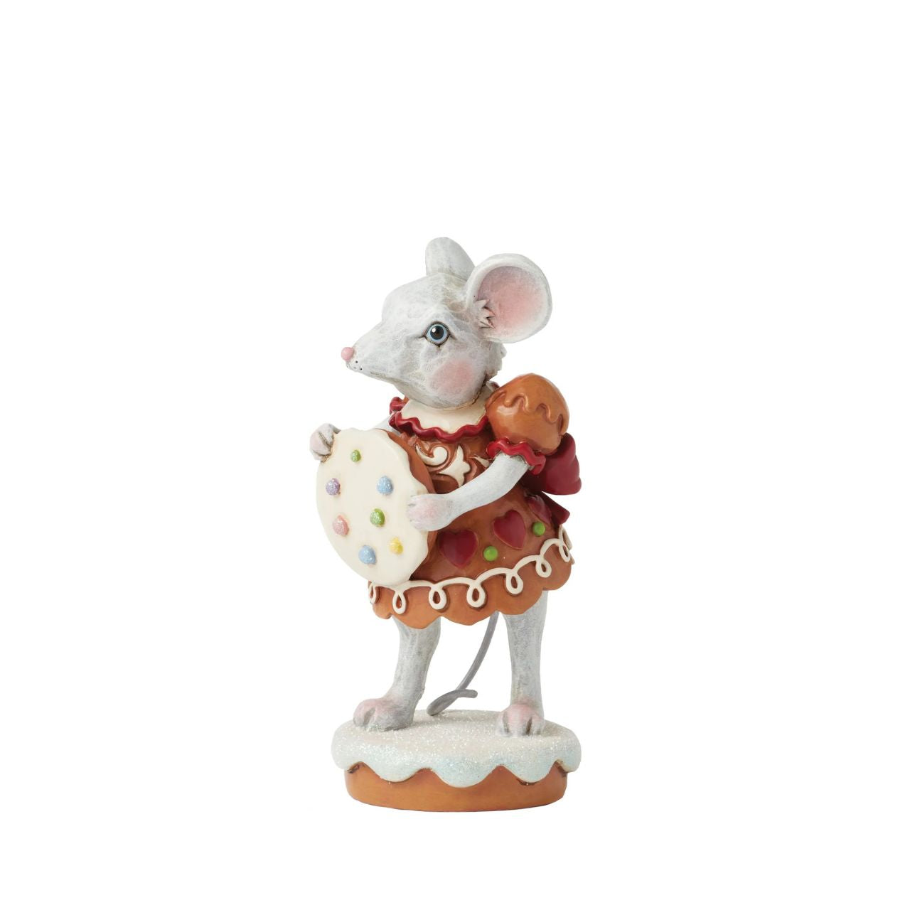 Wearing a festive gingerbread dress covered in intricate icing details, this sweet Gingerbread Christmas girl mouse by Jim Shore offers a sprinkled cookie with a warm smile.